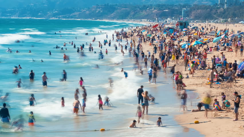 Time-lapse of people and waves at the Santa Monica, CA shoreline