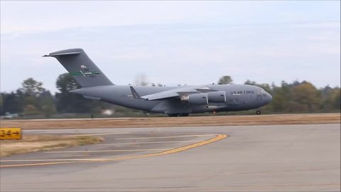 Joint Base Lewis-McChord, WA, USA - August 28, 2016: Heavy transport plane Boeing C-17 Globemaster III taking off.