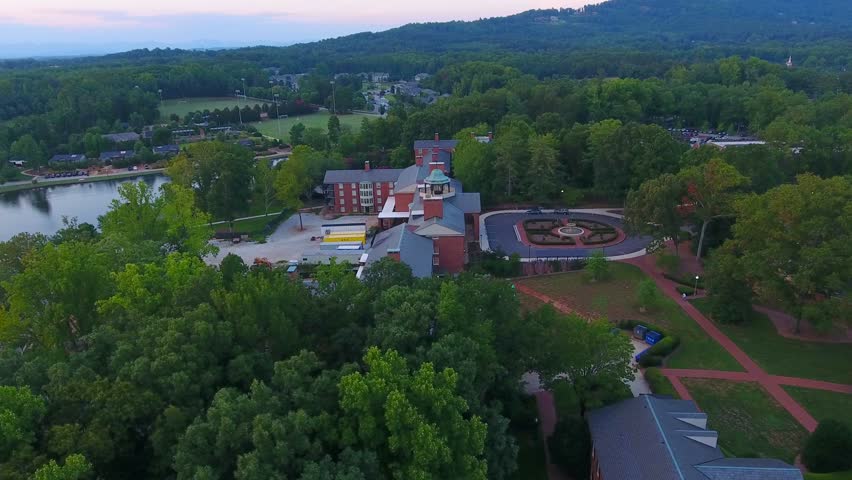 Flying over Furman University at sunset in upstate South Carolina. Beautiful college campus in SC. 