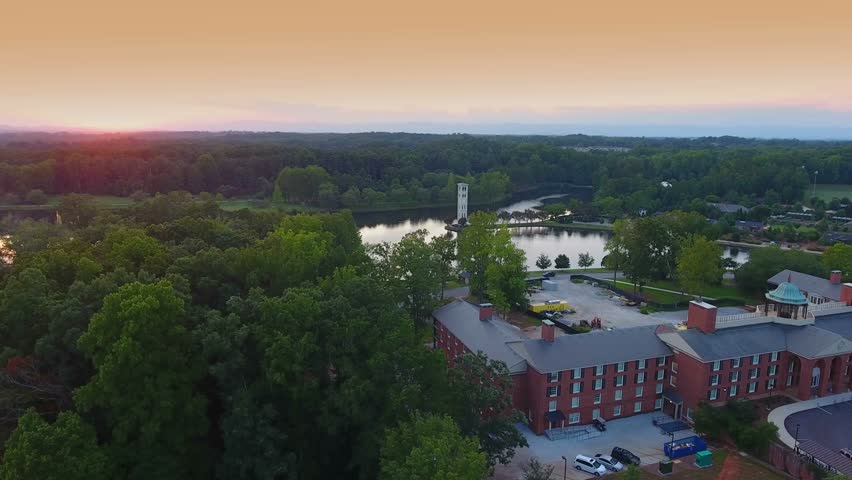 Flying over Furman University at sunset in upstate South Carolina. Beautiful college campus in SC. 
