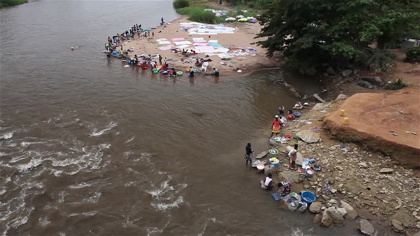 Women washing their clothes in the river