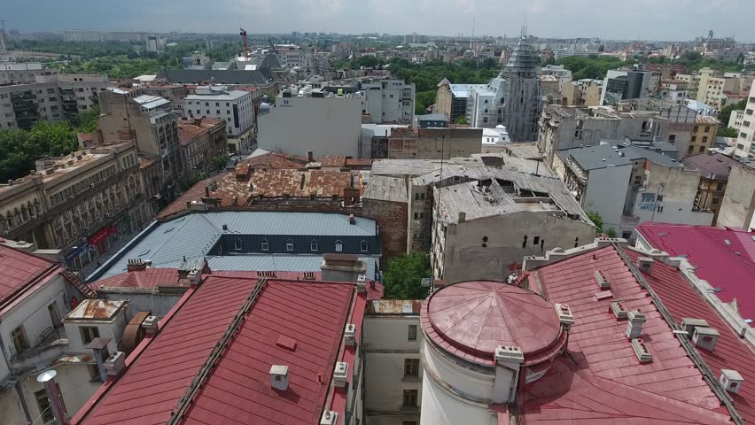 4K Aerial Shot Of The Romanian Flag In Bucharest City Center