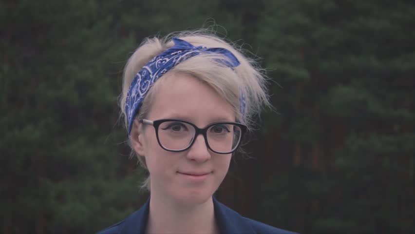 Portrait of a young girl in the forest