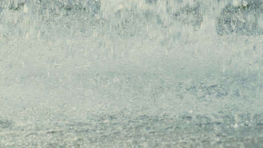 closeup of water splashing in the fountain Slow motion video