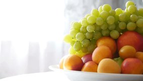 apricots and grapes lie on a plate breakfast healthy eating video