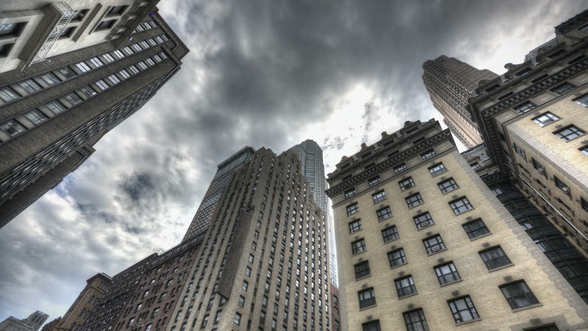 HDR Timelapse of Skyscraper in New York City with dark clouds passing by