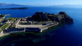 Old Fortress, Kerkyra Corfu castle island, Greece panoramic aerial 4k video. Sea ocean coast, old city, landmark fort