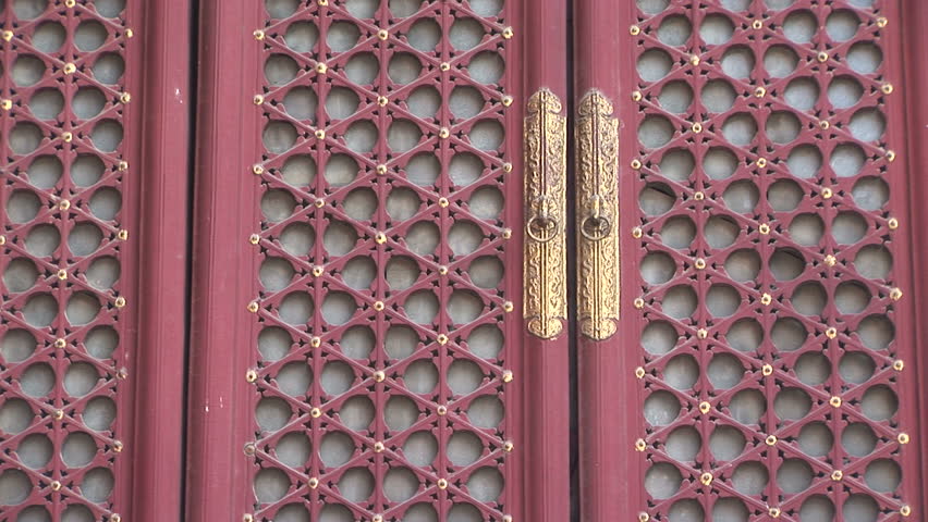 Ornate Chinese Doors in the Lama Temple, Beijing, China, zoom out. Format: NTSC HDV Compression: MotionJPEG-A Camera: Sony HVR-Z1U Size: 1080i (1920 x 1080) Sound: No