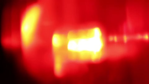 Flashing red LED light, extreme close-up