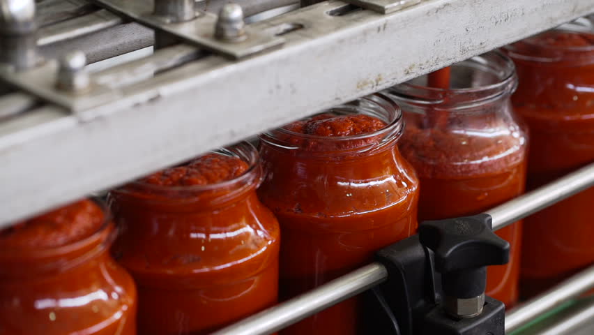 Automatic Line for Processing of Vegetables.Manufacturer Of Tomato Paste.Bottling Tomato Paste in Glass jars. | Shutterstock HD Video #19304701