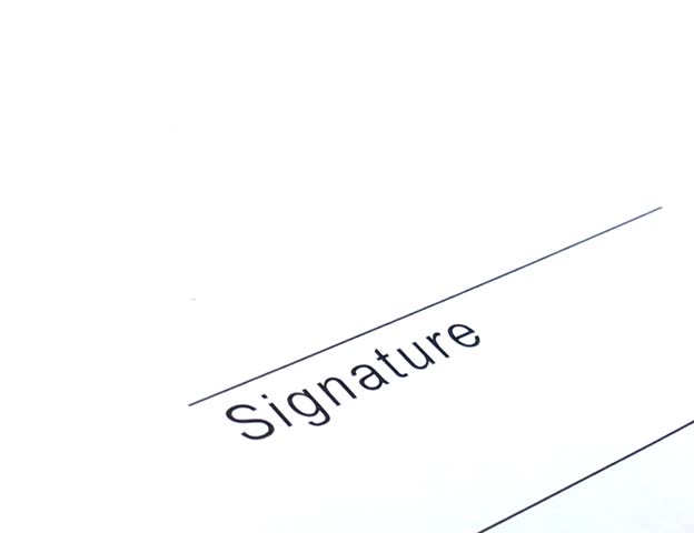 Closeup of signature writing