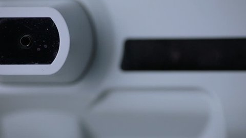 Modern automated medical machine examining eyeball. Eye examination test on a professional medical equipment screen.