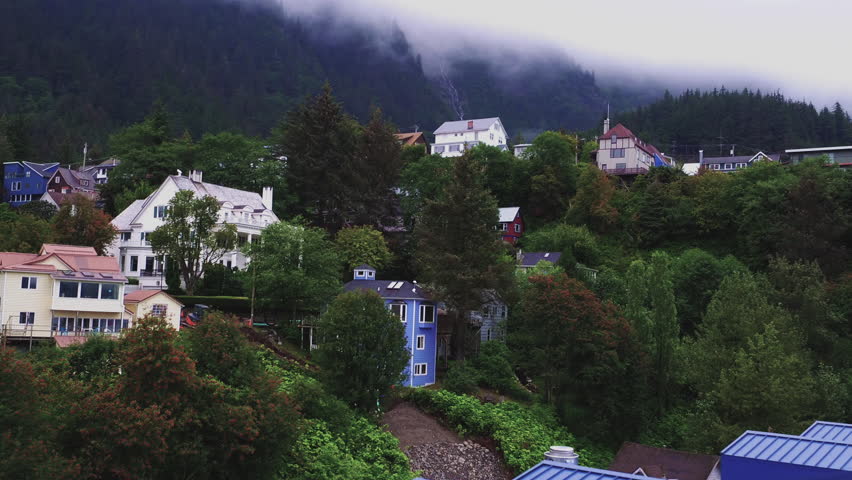 Aerial of Juneau Houses to waterfall on the Mountain