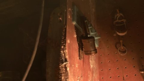 Old rusty padlock lit with lantern - Graded image