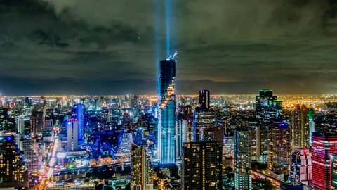BANGKOK, THAILAND - AUGUST 29 : Time Lapse, view at MahaNakhon skyscraper and spectacular lightshow on August 29, 2016 Bangkok,Thailand.(Camera Zoom out)