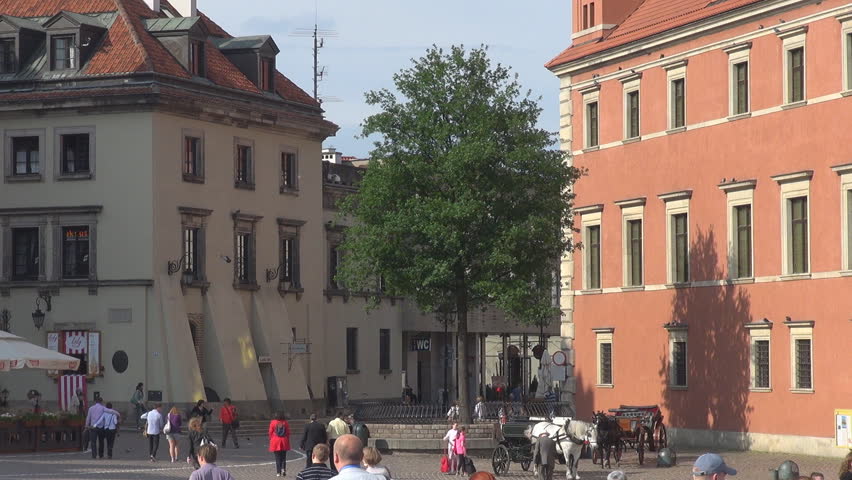 WARSAW, POLAND - MAY 13, 2011 Unidentified people walk in Castle Square 