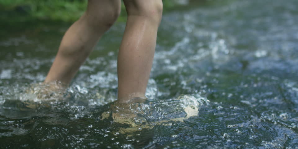 Slow motion handheld close-up of a boy wading shallow river rapids, shot on RED Epic Dragon R3D, 4K 120fps
 | Shutterstock HD Video #19366570