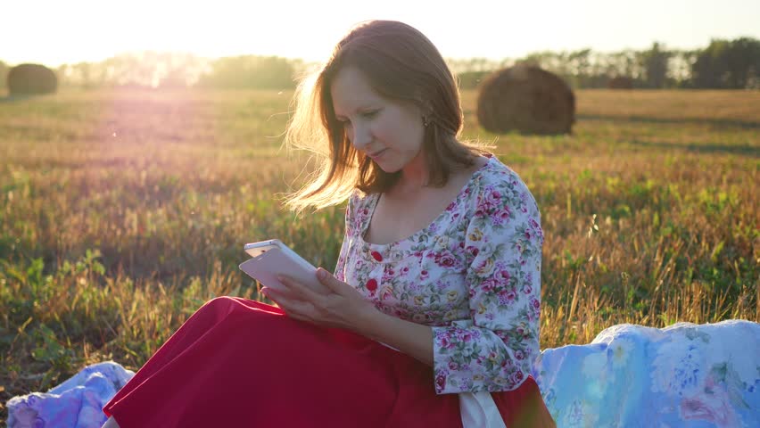 girl watching something in the smartphone