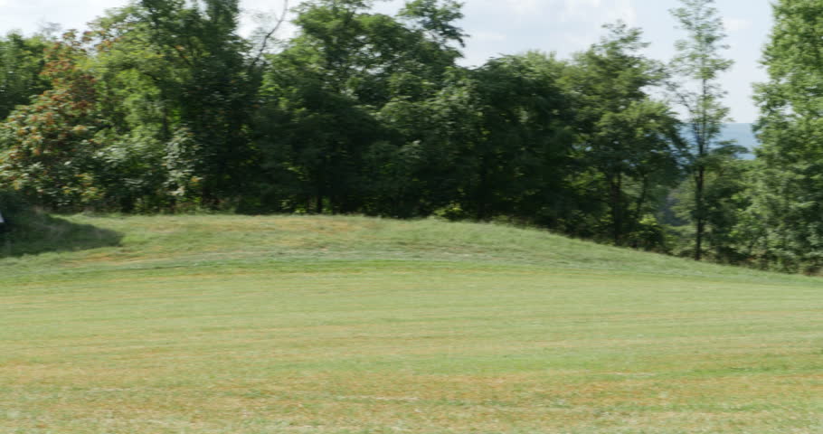Old Barn on Farmers Field with Blue Skies and Trees 10bit, 4K