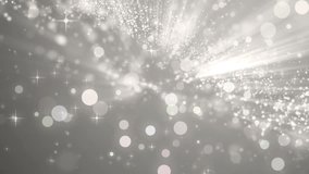 Brilliant grey for background.Particles silver in motion with the Rays. Explosion star