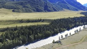 a flight over a mountain river in the Altai