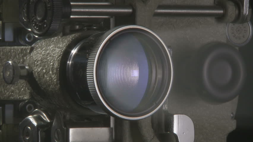 Close up of 16mm film projector lens at start up