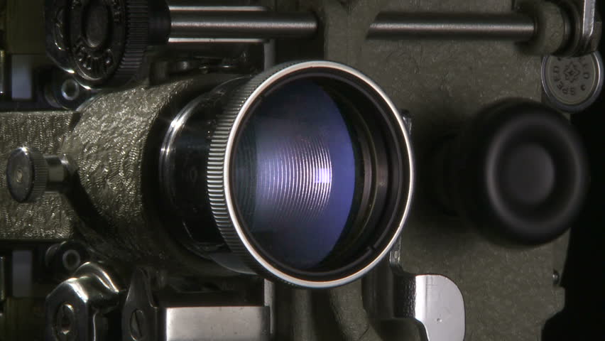 Close up of 16mm film projector lens at start up