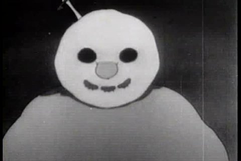 An Eskimo and his animal friends run from the snowman they created, who has inexplicably turned evil, in this cartoon from 1933. He succeeds in catching and eating a fish. (1930s)
