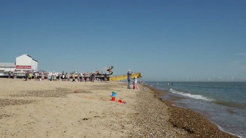 Great Yarmouth, England - August 2016. Tourist boat full of tourists on the beach at Great Yarmouth, Norfolk, England, United Kingdom