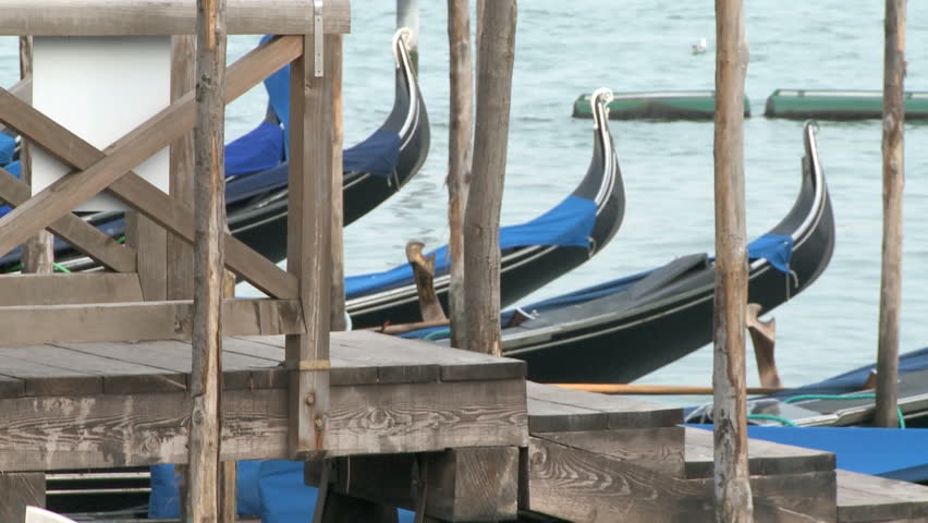 Empty gondolas in Venice at the waterfront
