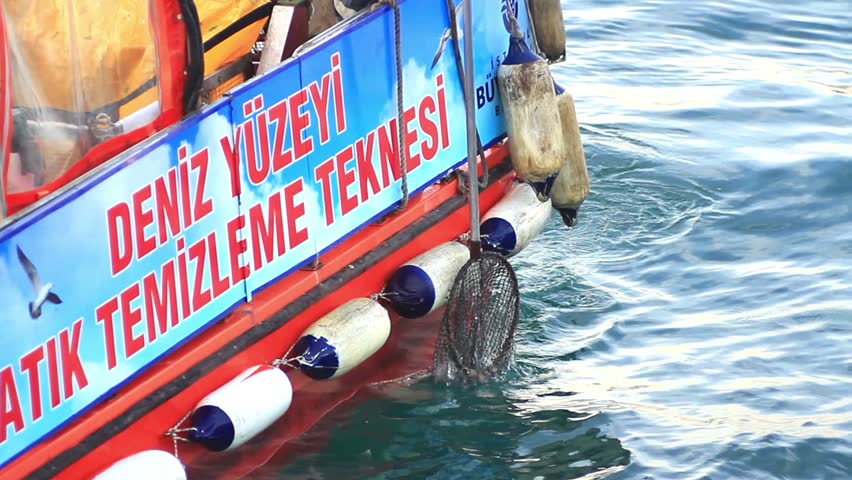ISTANBUL - JANUARY 4: Water surface cleaning boat at Halic Bay on January 4,