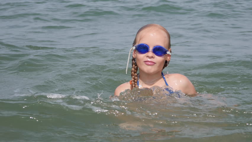 Girl on Sea Water Tumbles 4k