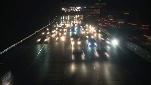 Traffic on the Busy Freeway at Night - Time Lapse