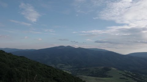 Running Clouds With Mountain Range and Trees Timelapse. Carpathian Mountains Landscape