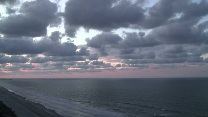 View from high rise of beach and beautiful ocean and sky shortly after daybreak - HD - 1920x1080