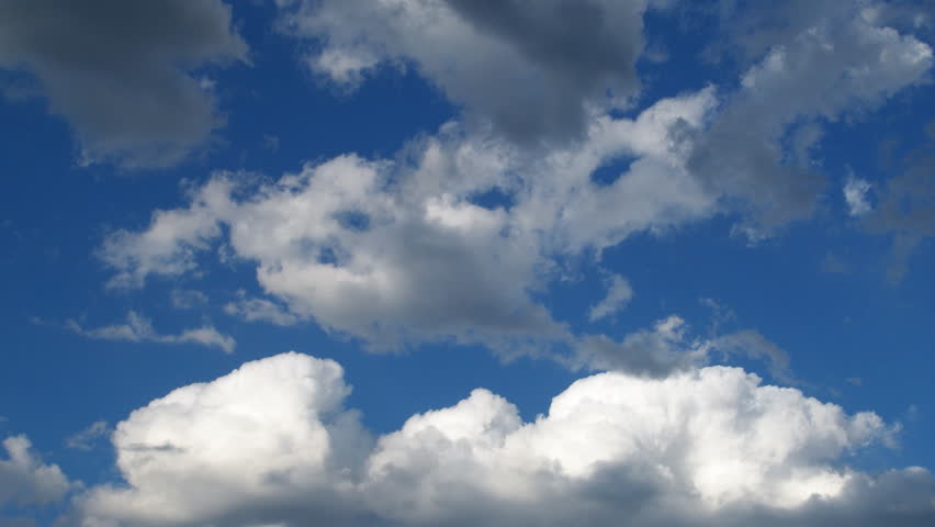 A beautiful time lapse of clouds in a blue sky.