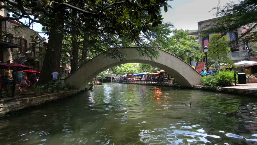 San Antonio riverwalk view going under bridge on sunny day 9