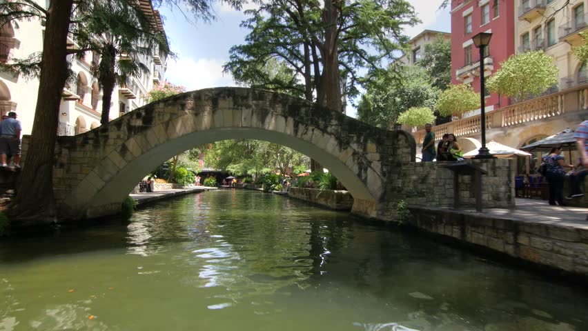 San Antonio riverwalk view going under bridge on sunny day 7