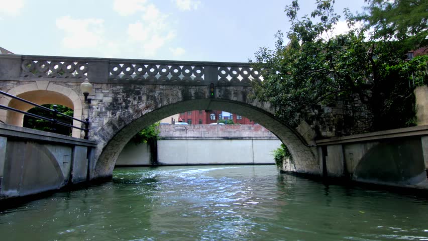 San Antonio riverwalk view going under bridge on sunny day 5