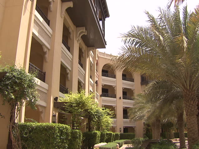 Architecture, Abu Dhabi. View of the landscaped garden and architecture of a luxury hotel complex. Abu Dhabi, UAE - 2013