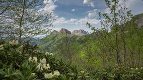 Russia, timelapse. The formation and movement of clouds over the summer slopes of Adygea Bolshoy Thach and the Caucasus Mountains