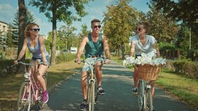 Group of young people on a bike trip, 4k Red Epic slow motion clip