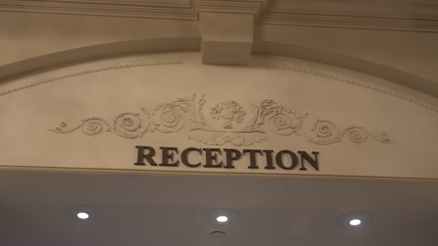 Hotel reception - Vintage look. Establishing shot of a hotel Lobby. 