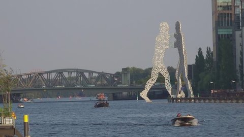 The huge Molecule Men Statue on River Spree in Berlin - BERLIN / GERMANY - AUGUST 31, 2016