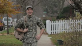 Soldier coming home and hugging his wife - Powered by Shutterstock - Get 15% off with code: PIKWIZARD15