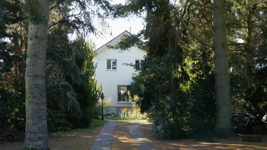 Goodbye, The End, Leaving: Metal Gate outside residential house closing