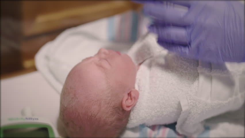 Nurse puts Stethoscope on Newborn Baby in Hospital to Check Heartbeat | Shutterstock HD Video #19541482