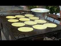 Making Pesarutu/Dosa (breakfast dish in India) clip 1