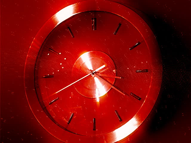 Clock with stars moving around it