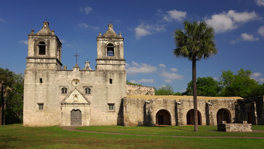 Clouds roll past the old Spanish Mission Concepcion in San Antonio, Texas, timelapse